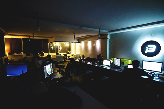 People working in i3Media office